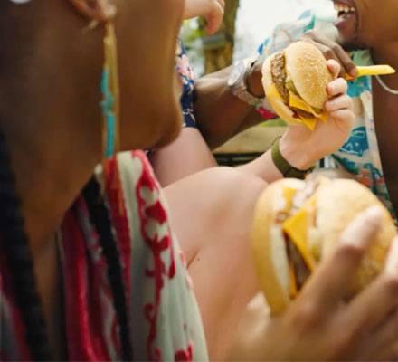 2 Females enjoying their burgers for lunch