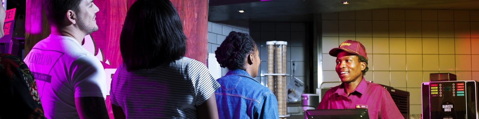 People ordering in-store from a steers franchise