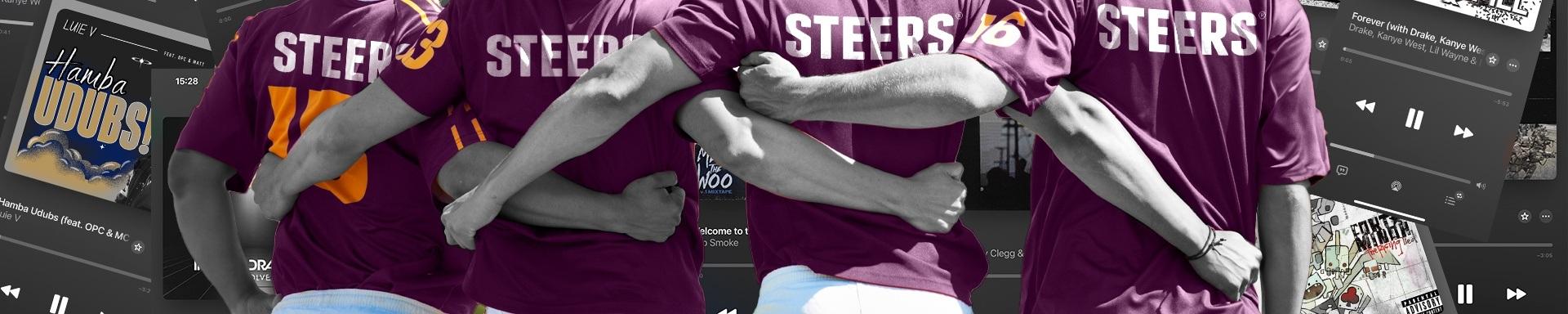 People embracing each other wearing Steers merchandise