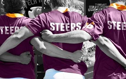 People embracing each other wearing Steers merchandise